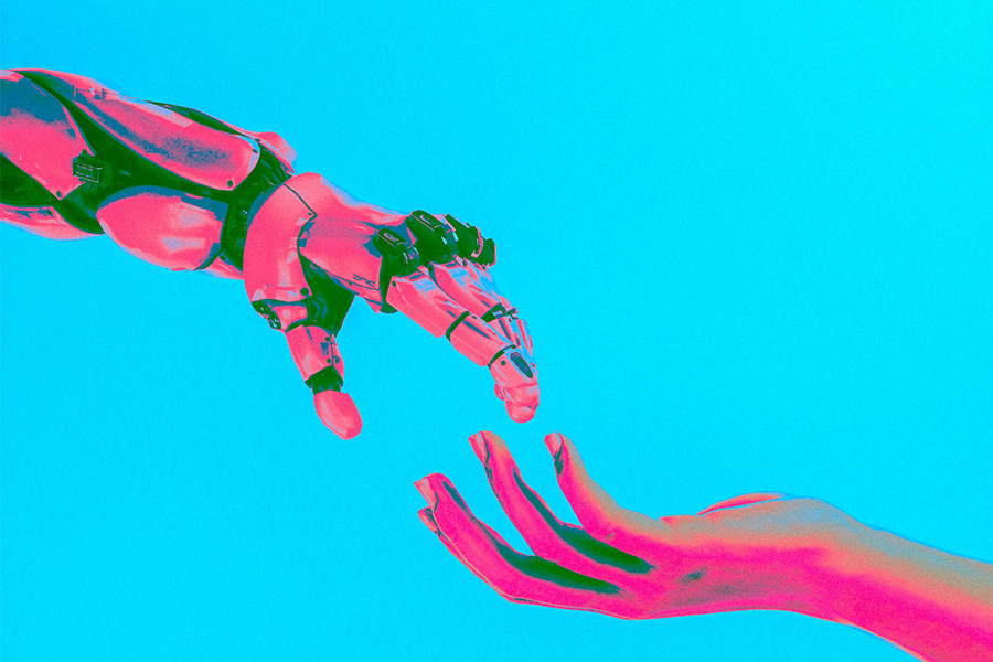 Die Hand eines Roboters berührt fast die Hand eines Menschen.